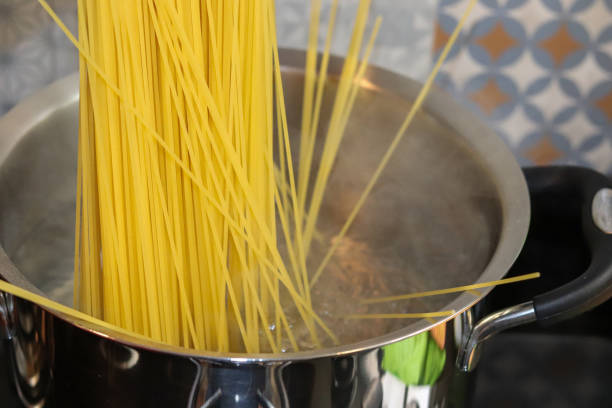 istock The exact moment when spaghetti comes into contact with boiling water. 1215779141