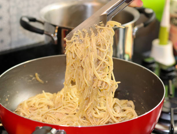 istock Delicious chicken spaghetti with four cheeses. 1215779737