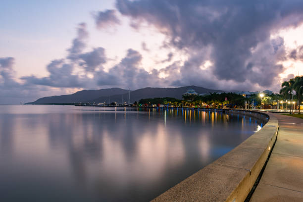 Esplanade at dusk in Cairns with artificial beach, Queensland, Australia