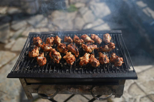 istock Chicken on the BBQ grill. 1215780990