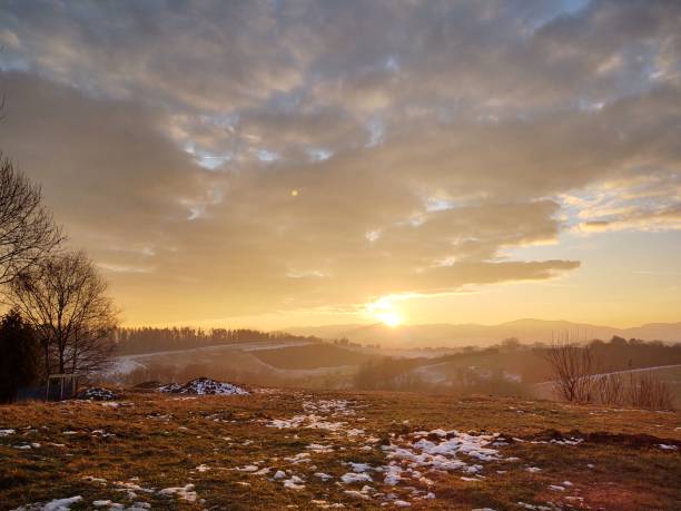 istock Sunrise or sunset over the hills and meadow. 1215781620