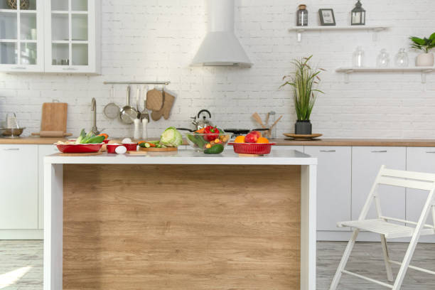 istock Modern stylish kitchen interior with vegetables and fruits on the table . 1215788300