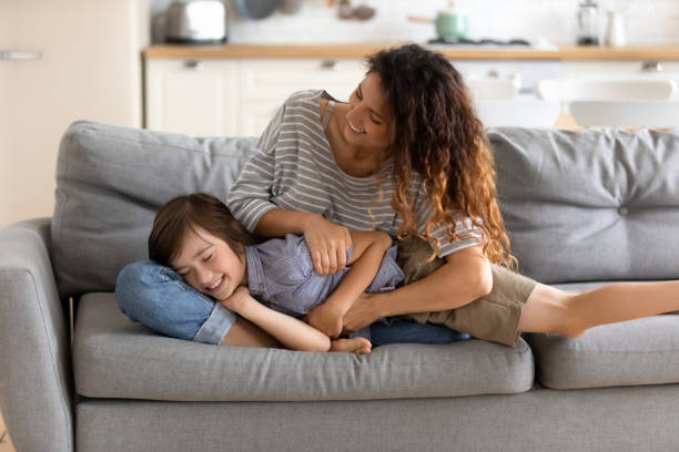 istock Young mother have fun playing with small son 1215789550