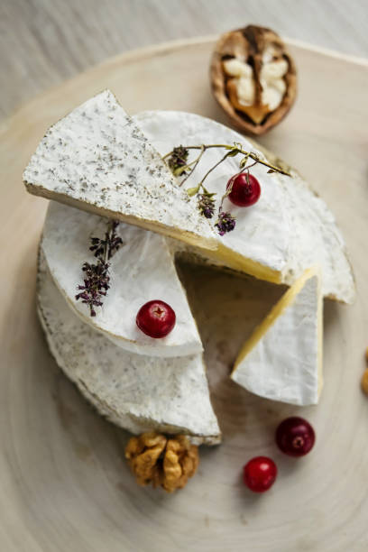 istock craft organic cheese (camembert, brie) with berries 1215790910