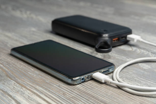 istock Phone and charging devices, power storage and charging cable 1215791036