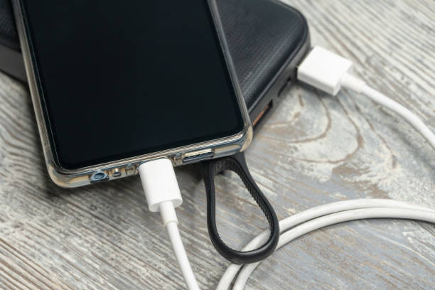 istock Flay lay of phone and charging devices, power storage and charging cable 1215791404