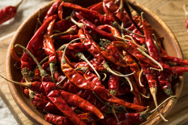 istock Raw Red Organic Chile de Arbol Peppers 1215792504