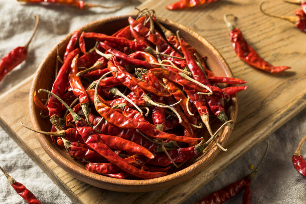 istock Raw Red Organic Chile de Arbol Peppers 1215793111