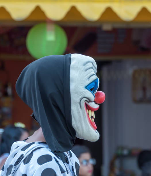 Bezerros city, Pernambuco state, Brazil - February 24, 2020:Known as Papangus, the masked people are a very traditional in Bezerros street carnival.