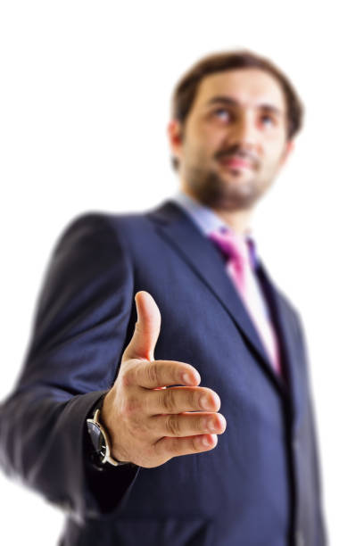 istock Young businessman offering his hand 1215798443