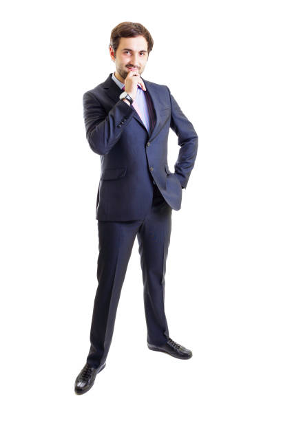 istock Smiling businessman with hand on hip 1215798639