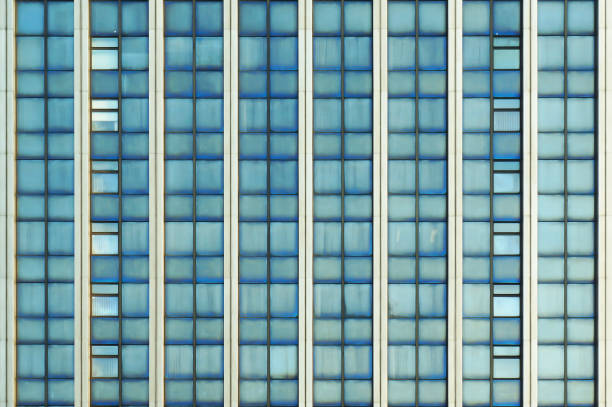 istock Windows on facade of modern building. 1215799016