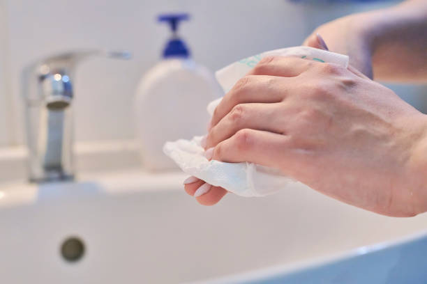 istock Woman washing hands 1215799968