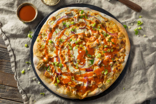 Homemade Buffalo Chicken Pizza Homemade Buffalo Chicken Pizza with Blue Cheese artisanal food and drink stock pictures, royalty-free photos & images