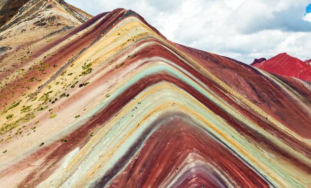 istock Rainbow mountains or Vinicunca Montana of Seven Colors 1215802411