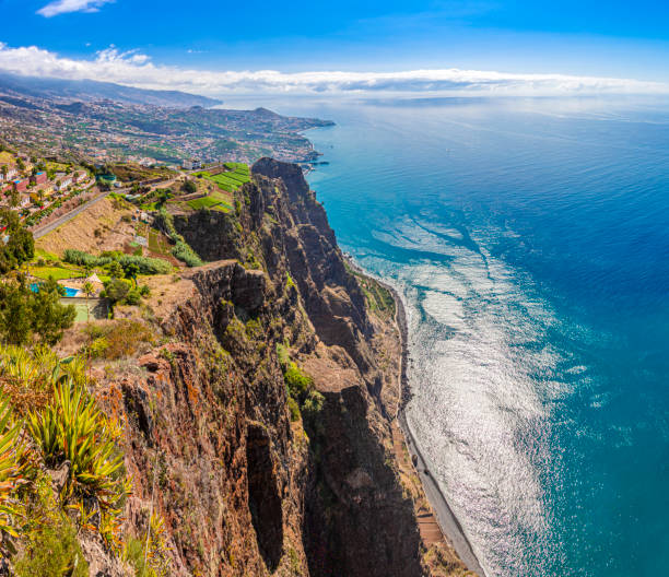 view from european highest cliffs fajas de cabo girao on te portugese island of madeira in summer - funchal imagens e fotografias de stock