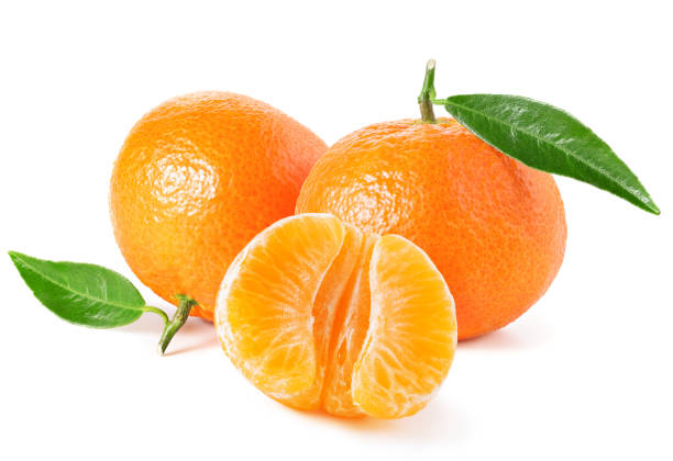 istock Tangerines or clementines with green leaf on white 1215803722
