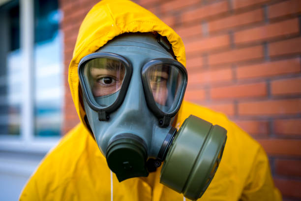 istock Close up of man with gas mask 1215803873
