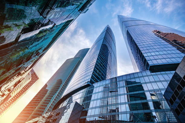 istock Corporate business buildings against blue sky 1215808608