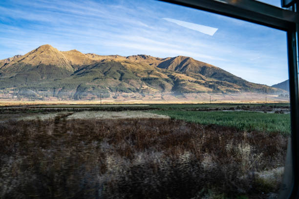 istock Mountains and Farm Land 1215811544