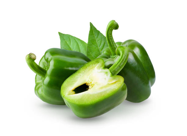 istock Green pepper full depth of field on white background 1215812939