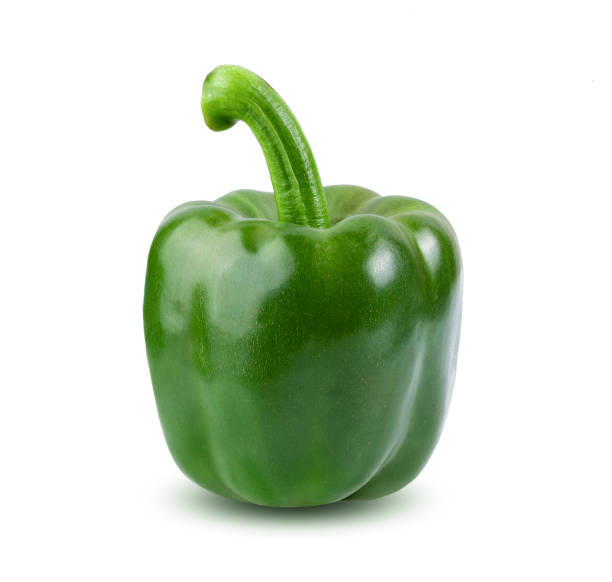 istock Green pepper full depth of field on white background 1215812970