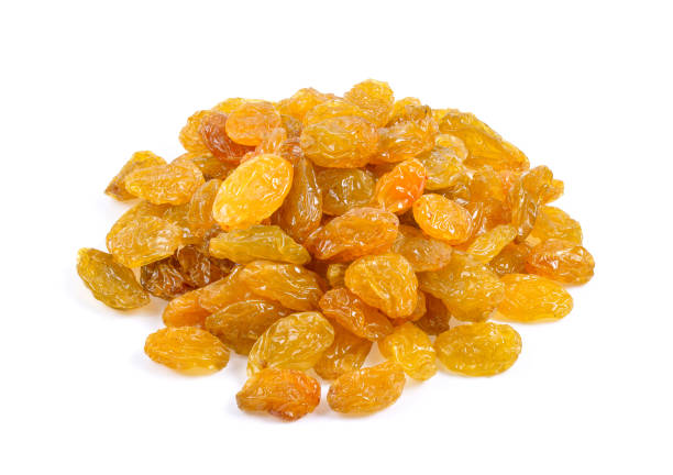 istock Yellow golden raisins isolated on white background 1215812980