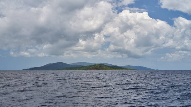 View from the sea to Guanaja island stock photo