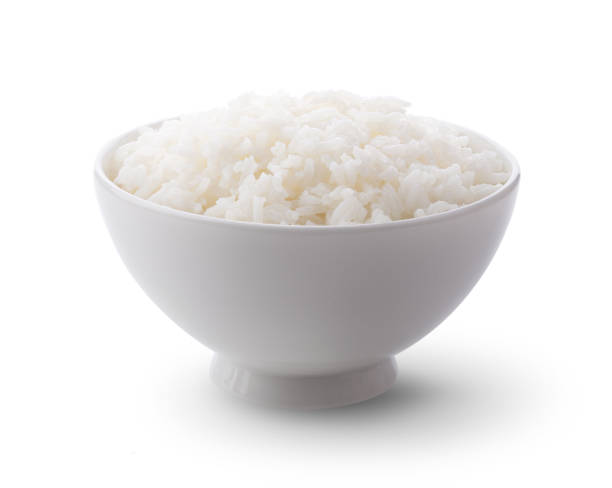 istock Cooked Jasmin Rice in white bowl on white background. full depth of field 1215818425