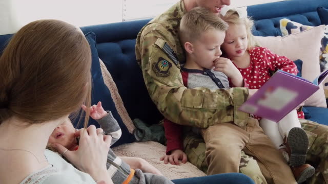 Military Dad with Young Family Home During Holidays Enjoying Time Together