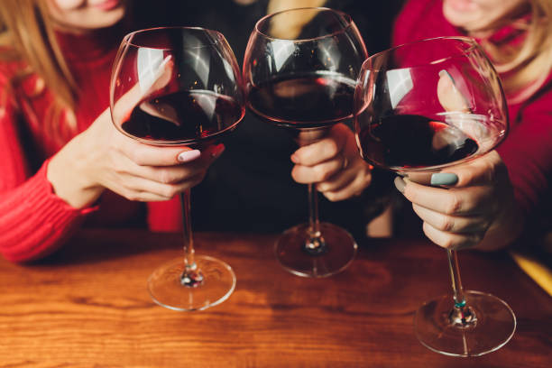istock Clinking glasses with alcohol and toasting, party. 1215820806