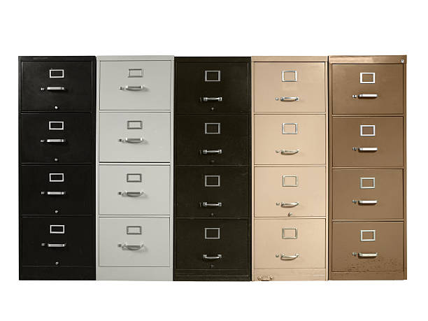 Funky Files Funky collection of vintage metal file cabinets. filing cabinet photos stock pictures, royalty-free photos & images