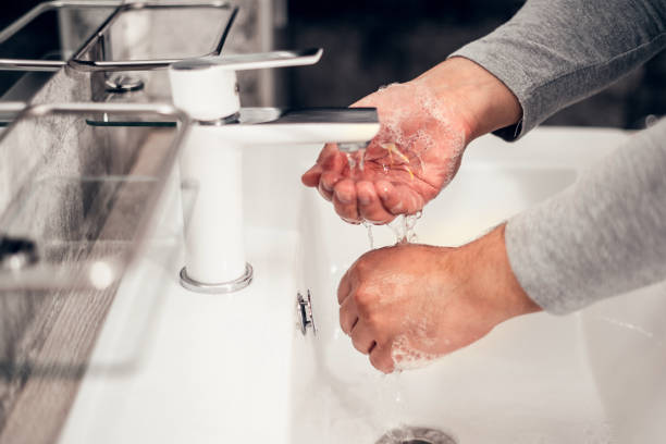 istock Coronavirus. Proper washing and handling of hands. Liquid antibacterial soap. Self-isolation and hygiene. 1215821649