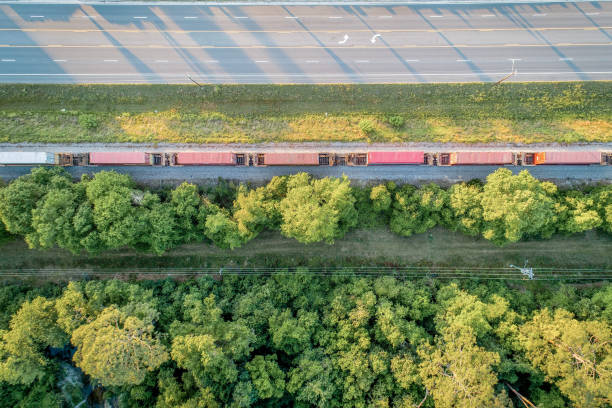 A train idles on tracks alongside U.S. Highway 84 in the Georgia town of Waycross.