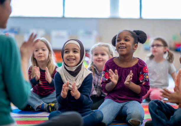 istock Singing And Clapping In Class stock photo 1215828850