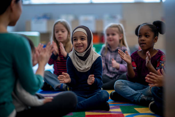 istock Singing And Clapping In Class stock photo 1215828860