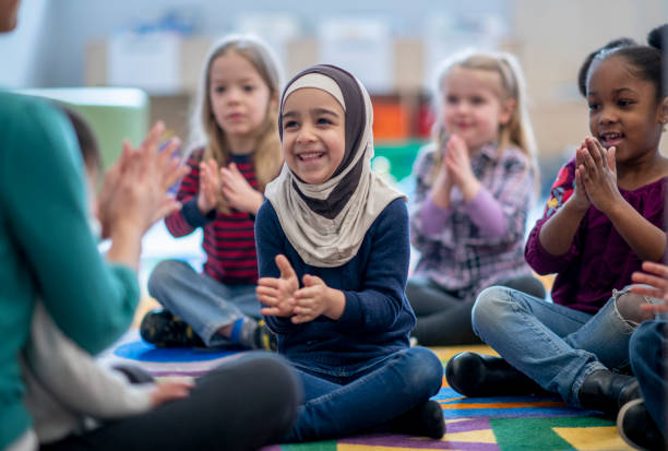 istock Elementary School Students Learning in the Library stock photo 1215828863