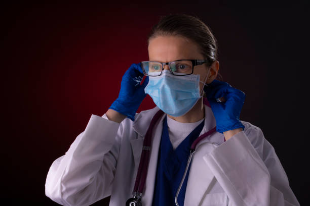 istock COVID-19 healthcare worker using PPE protective equipment 1215832553