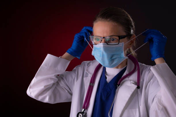 istock COVID-19 healthcare worker using PPE protective equipment 1215833168