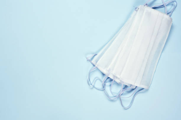 istock Stack of face masks. Shortage or deficit medical masks 1215834047