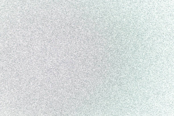 istock Silver color glitter paper textured background 1215840795