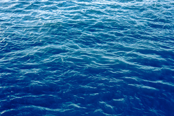 istock Blue sea wave close up, low angle view for summer background. 1215841604