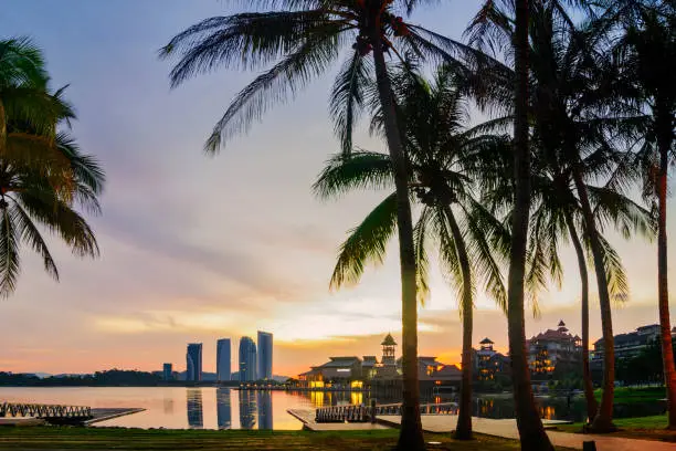 Photo of beautiful sunrise background surring lake shore in Putrajaya, Malaysia