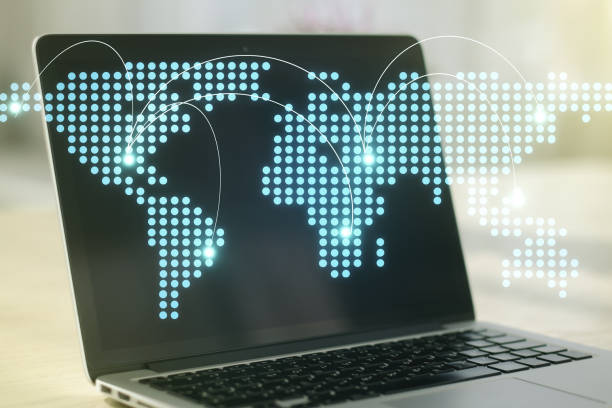 istock Abstract creative world map with connections on modern laptop background, international trading concept. Multiexposure 1215844271