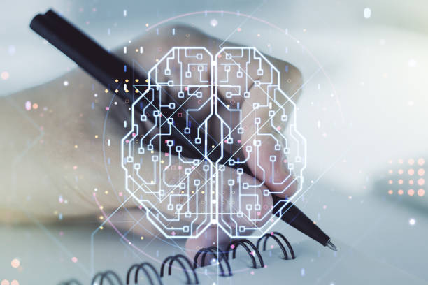 istock Creative artificial Intelligence concept with human brain hologram and man hand writing in notebook on background. Multiexposure 1215845008