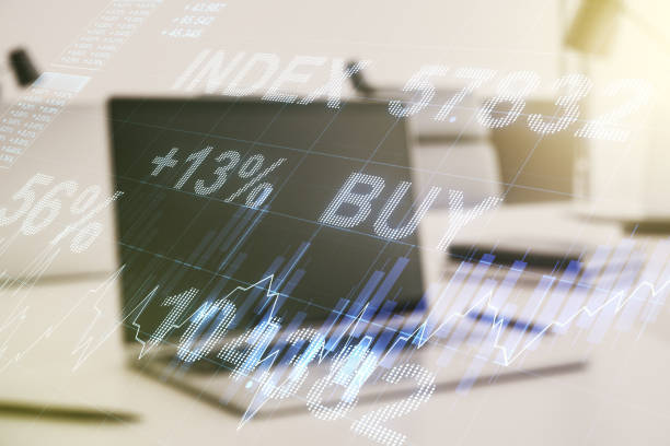 istock Abstract creative financial graph on modern laptop background, financial and trading concept. Multiexposure 1215845188