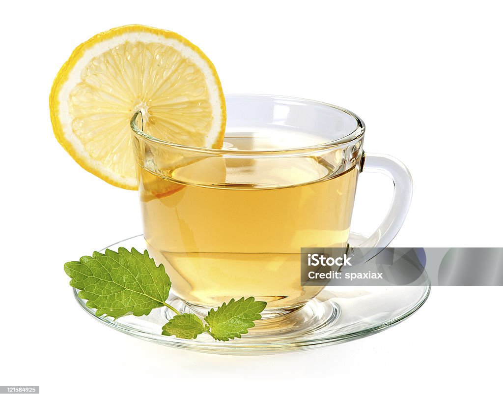 Copa taza de té con hojas de menta y limón - Foto de stock de Alimento libre de derechos