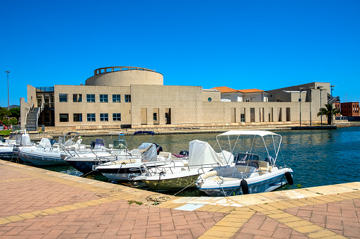 Olbia, Sardinia / Italy - 2019/07/21: Panoramic view of the Archeological Museum of Olbia - Museo Archeologico - on Gulf of Olbia island at the port area