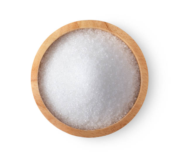 istock sugar in wood bowl on white background. top view 1215856145