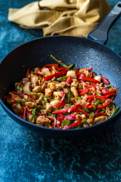 istock Homemade Spicy Szechuan Chicken / Dragon Chicken in Wok. 1215856420